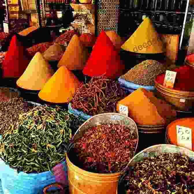 A Vibrant Spice Market In Morocco, Showcasing An Array Of Aromatic Spices And Colorful Ingredients. Stirring The Pot Quraisha Dawood